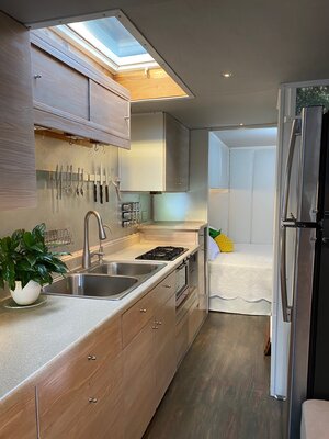 2003 Freightliner RV- front to rear kitchen skylight.jpeg