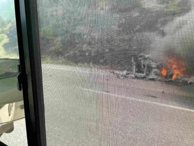 02 02  July 23 2026  Vehicle fire on the Coquhalla started a wild fire.JPG